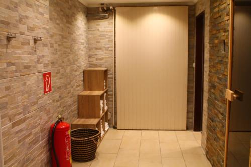 a hallway with a fire hydrant and a door at Lachtalhaus in Lachtal