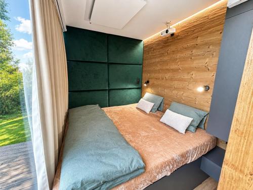 Llit o llits en una habitació de Za Zrcadlem