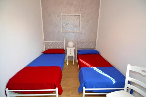 Cama o camas de una habitación en Villa Pesce