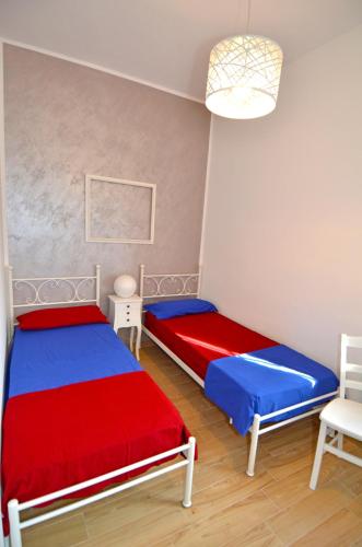 Cama o camas de una habitación en Villa Pesce