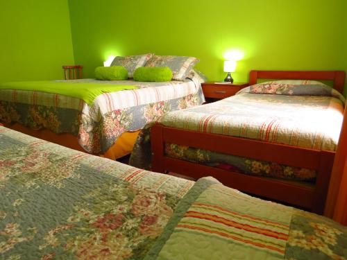 Voodi või voodid majutusasutuse Hostal Benavente toas