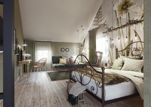 a bedroom with a bed and a living room at Boutiquehotell Dahlbogården in Alingsås