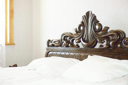 Postel nebo postele na pokoji v ubytování Guesthouse Zedafoni
