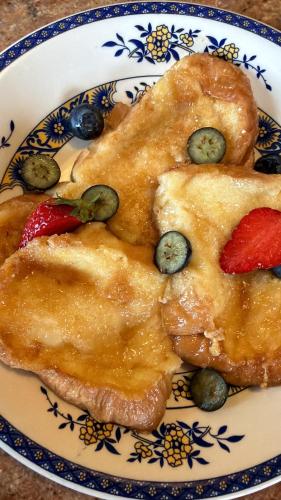 a plate of food with fruit on it at La Cubanita in Kojsko