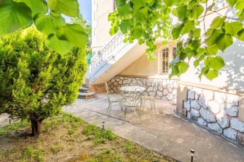 Charming 1BDR 2P flat with a garden
