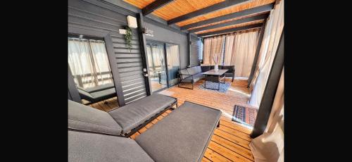 a living room with a couch and a table at House no 4 in Pakoštane