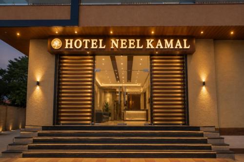 a hotel neeliah karnal with stairs in front of it at Hotel Neel Kamal-Near KhatuShyamJi Temple in Khātu