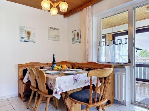 a dining room with a table and chairs at Apartment Sirch-2 by Interhome in Diedorf
