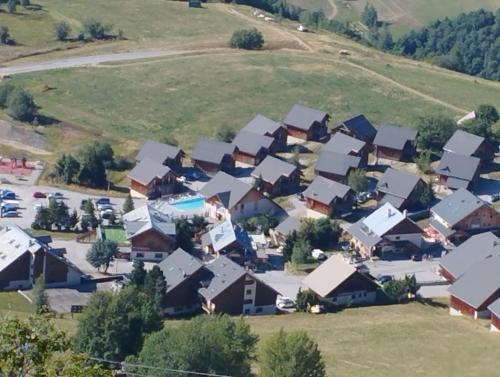 an aerial view of a village with houses at Studio plein sud avec piscine in Saint-Jean-dʼArves