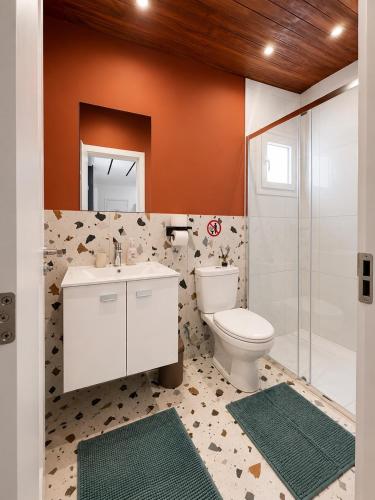 a bathroom with a toilet and a sink and a shower at Modern Studio 7 private Kitchenette and Bathroom in Limassol