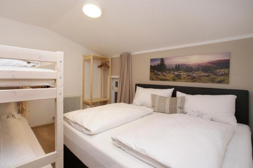 Postel nebo postele na pokoji v ubytování Chalet Zeller Moos