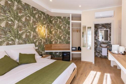 a bedroom with a bed and a wall mural at Lotus B&B in Messina