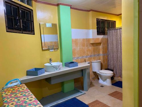 a bathroom with a sink and a toilet at Maeganbeverly's Place in Santa Fe