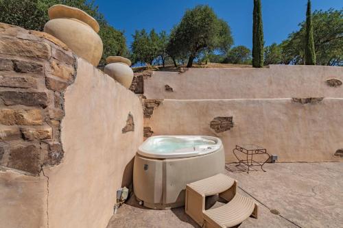 a toilet sitting on the side of a wall at Red River Retreat in Paso Robles