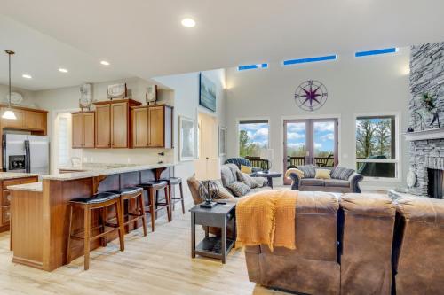 a kitchen and living room with a couch and chairs at The Pointe at North View in Banner Elk