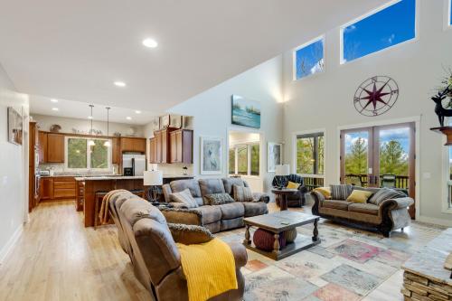 a large living room with couches and a kitchen at The Pointe at North View in Banner Elk