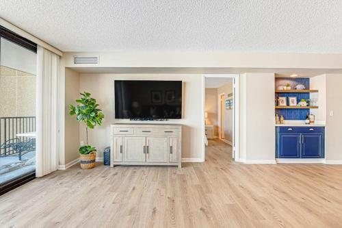 a large living room with a flat screen tv at Sea Colony - 302S Edgewater in Bethany Beach