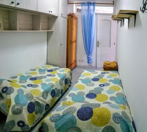 Cama o camas de una habitación en Monseñor