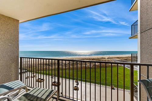 a balcony with a view of the beach at Sea Colony --- 508 Dover House Rd in Bethany Beach