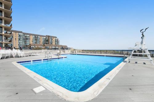 a large swimming pool on top of a building at Sea Colony --- 508 Dover House Rd in Bethany Beach