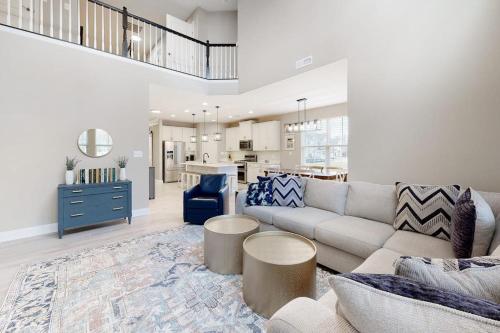a living room with a couch and a kitchen at Bishops Landing --- 38480 Carroll Dr in Millville
