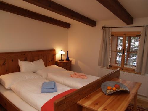 A bed or beds in a room at Apartments Stegmühle
