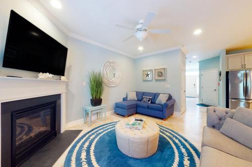 a living room with a couch and a fireplace at Bayside Resort 2639zero Seabreeze Lndg in Selbyville