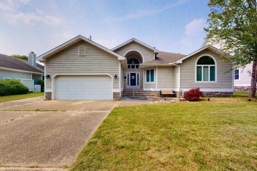 a large white house with a driveway at Salt Pond --- 314 Walkabout Rd in Bethany Beach