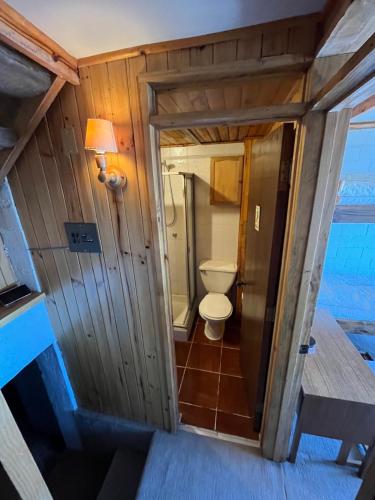an overhead view of a bathroom with a toilet at Refugio de Montaña, excepcional in El Colorado
