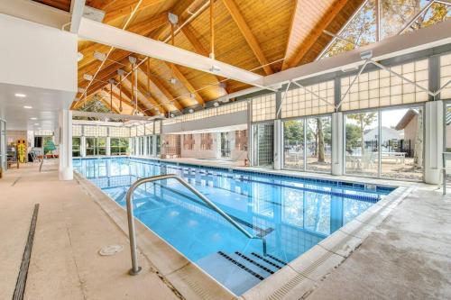 a large indoor swimming pool with a large swimming pool at Bear Trap Dunes --- 124 October Glory Ave Unit #B in Ocean View