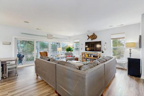 a living room with a couch and a table at 39609 Waterworks Ct in Bethany Beach