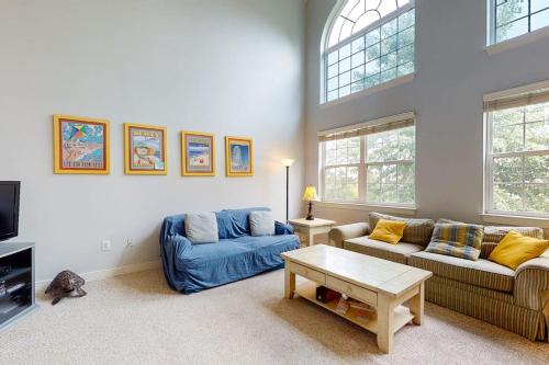 a living room with two couches and a coffee table at Wedgefield - 7 Saint George in Ocean View