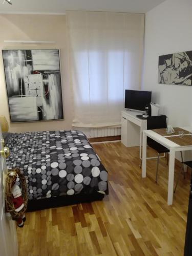 Ένα ή περισσότερα κρεβάτια σε δωμάτιο στο B&B Stazione Latina
