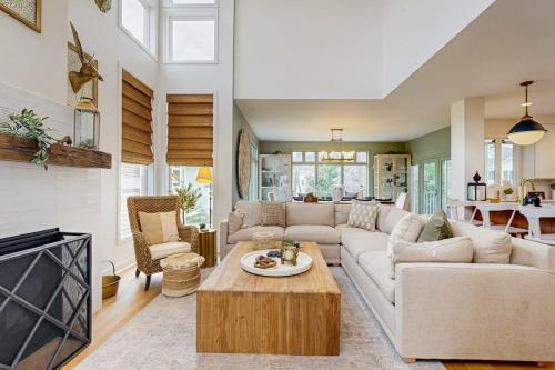 a living room with a couch and a coffee table at Sea Colony - 58011 Wimbledon in Bethany Beach