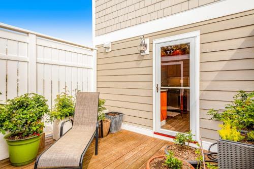 a porch with a bench on a house at Lewes --- 6 Pilot Point in Lewes