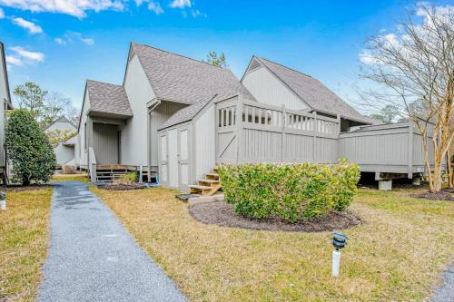a large white house with a yard at Sea Colony - 6301 Private in Bethany Beach