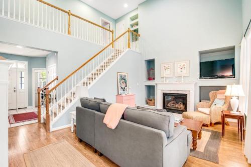 a living room with a couch and a fireplace at Bear Trap Dunes 16 Sycamore St in Ocean View