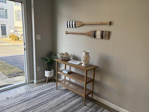 a room with a table and a wall with a baseball bat at South Hampton --- 38118 E Chester Ln in Ocean View