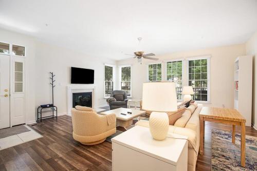 a living room with a couch and a fireplace at Bear Trap Dunes --- 45A Willow Oak in Ocean View