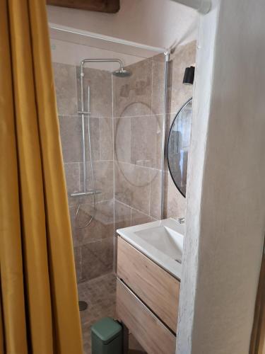 a bathroom with a shower and a sink at Casa Olea in Sartène
