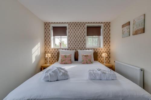 Postel nebo postele na pokoji v ubytování B&B vakantieappartementen Dalerheugte