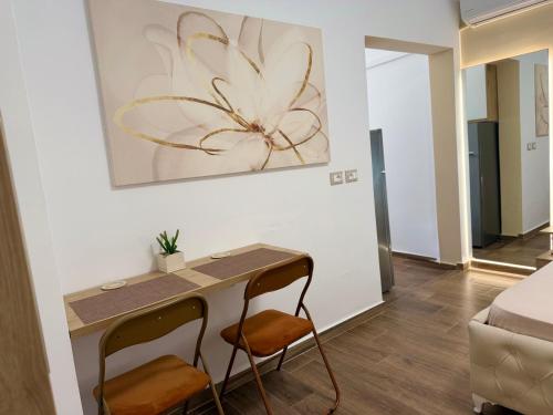 Postel nebo postele na pokoji v ubytování Kay Central Studio