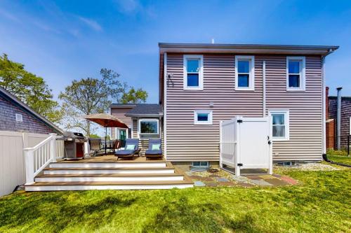 a house with a staircase leading to a house at Sunset Cove Retreat in Wareham