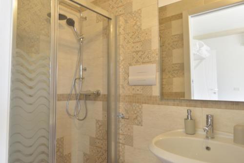 a bathroom with a shower and a sink at Casa Nannì in Polignano a Mare