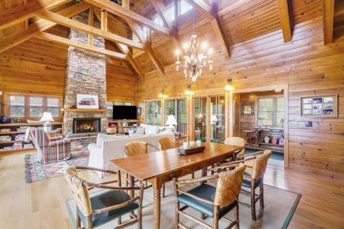 a dining room with a table and chairs at Platte Lake Paradise in Beulah
