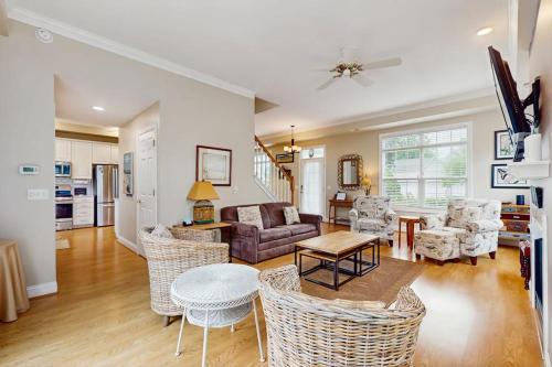 a living room with a couch and chairs and a table at Beacon Court Condo F in Douglas