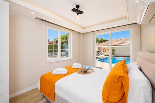a room with a bed and a window at Villa Central in Dalyan