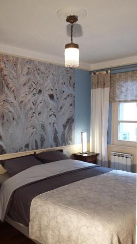 Postel nebo postele na pokoji v ubytování Commanderie Cottage Colmar