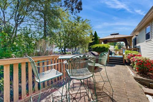 a patio with chairs and a table on a fence at Ocean Way Estates - 32563 W Riga Dr in Ocean View