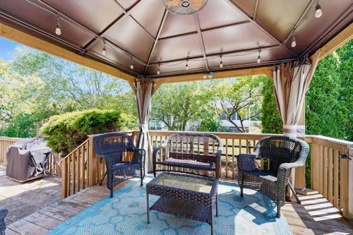 a gazebo with chairs and tables on a deck at Ocean Way Estates - 32563 W Riga Dr in Ocean View